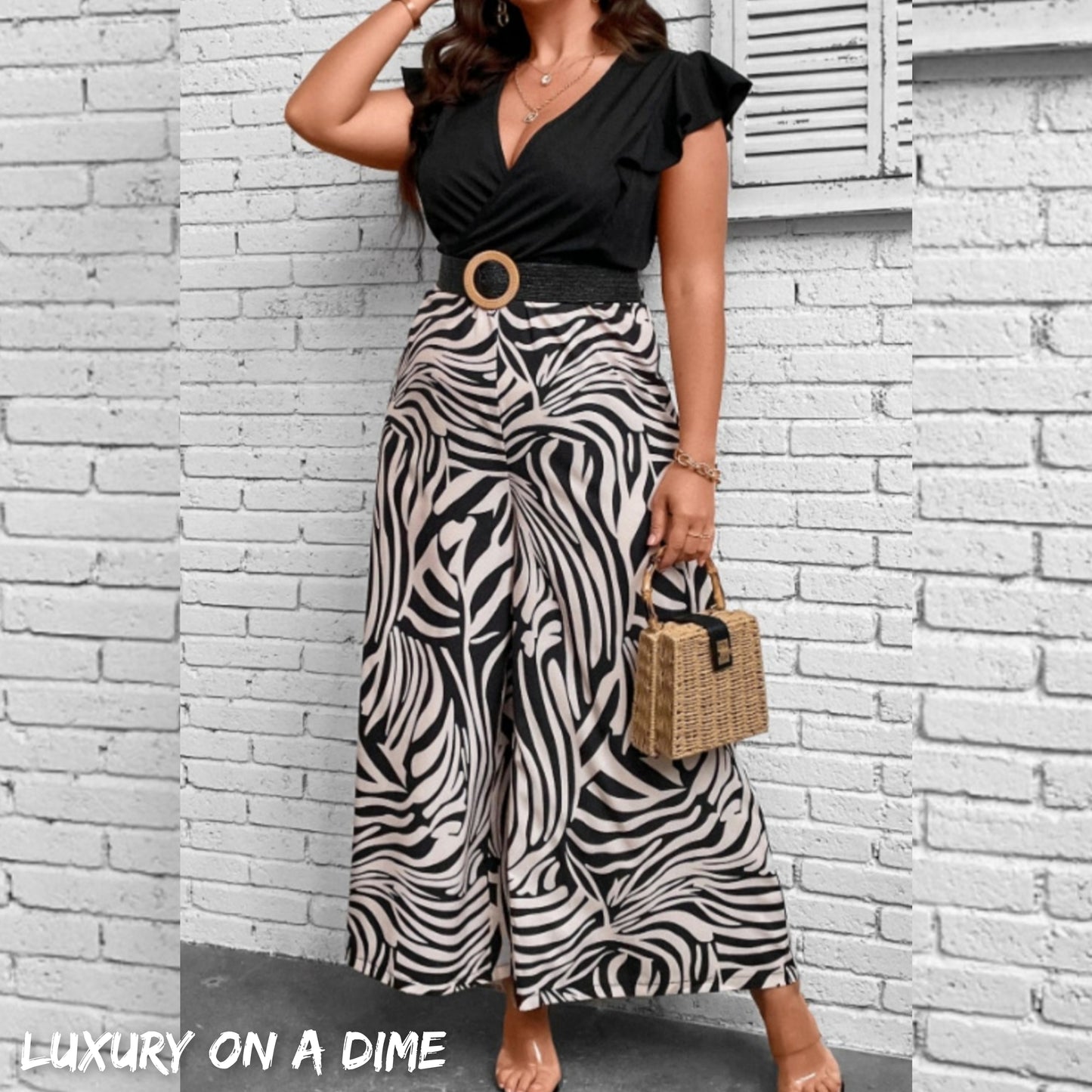 Plus Size Printed Surplice Neck Wide Leg Jumpsuit