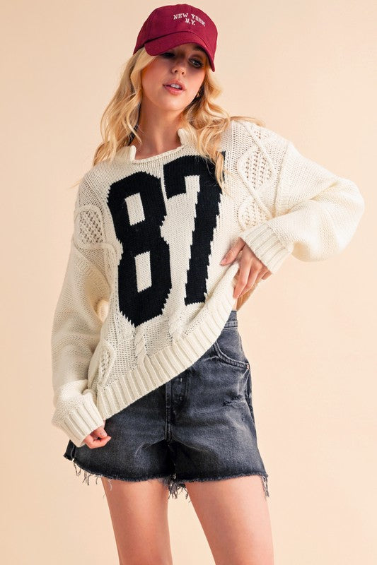 Aemi+Co Cable Knit Sweater 87 Retro Collegiate Varsity Wool Pullover Shark-Bite Top